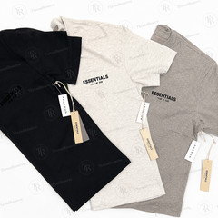 Fear of Gods Essentials T-shirts in Black, White, and Gray.