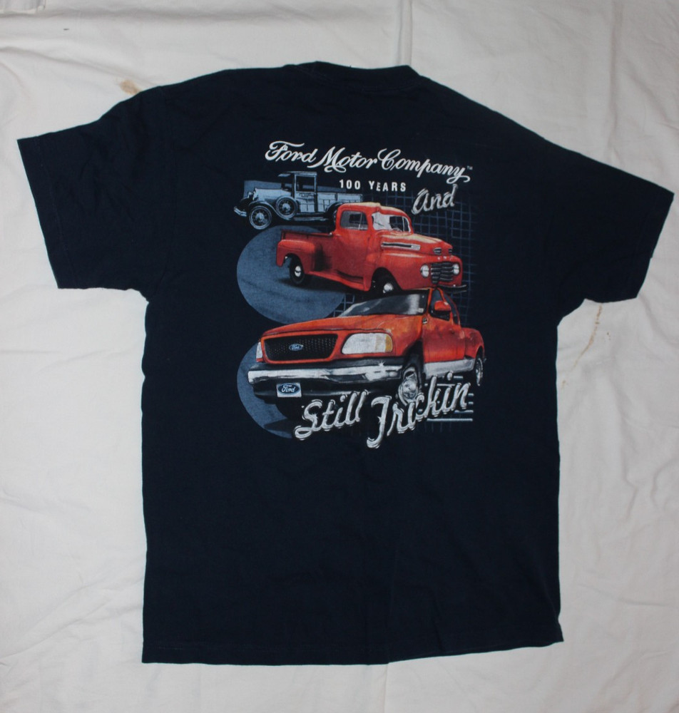 FORD MOTOR COMPANY – 100 YEARS AND STILL TRUCKIN’ – USED EXCELLENT – SIZE LARGE
