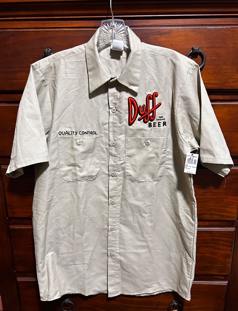 NWT Universal Studios The Simpsons Duff Beer Quality Control Work Shirt Tan Med