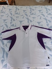 Pro Celebrity “Moisture Management”. White/Purple. Excellent Pre-Owned. Large