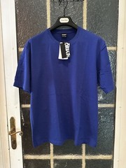 solid Blue Tshirt New Not true to size equivalent med-large 100% Cotton