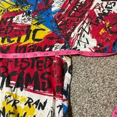 Multicoloured graffiti style graphic tee with bold designs